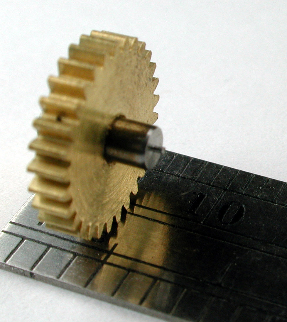Spur Gear, 72DP x 29 Teeth x 11.0mm OD x 0.074" Face x 2.4mm Bore, Brass, Assembled on 2.4mm x 6.22mm Shaft