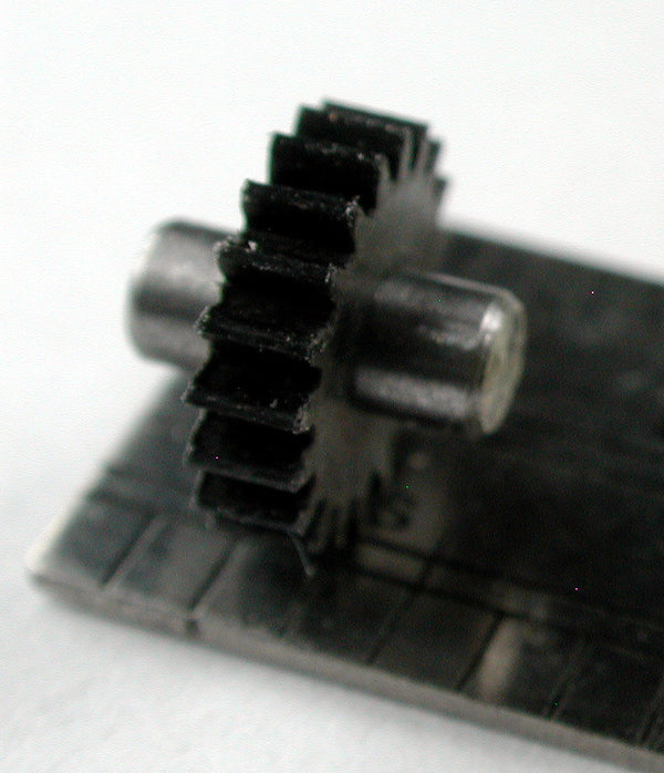 Spur Gear, 72DP x 19 Teeth x 7.3mm OD x 0.079" Face x 2.5mm Bore, Delrin, Assembled on 2.5mm x 6.3mm Shaft