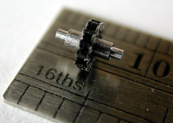 Spur Gear, 0.3mod x 12 Teeth x 4.0mm OD x 0.047" Face x 1.5mm Bore, Delrin, Assembled on 1.5mm Shaft